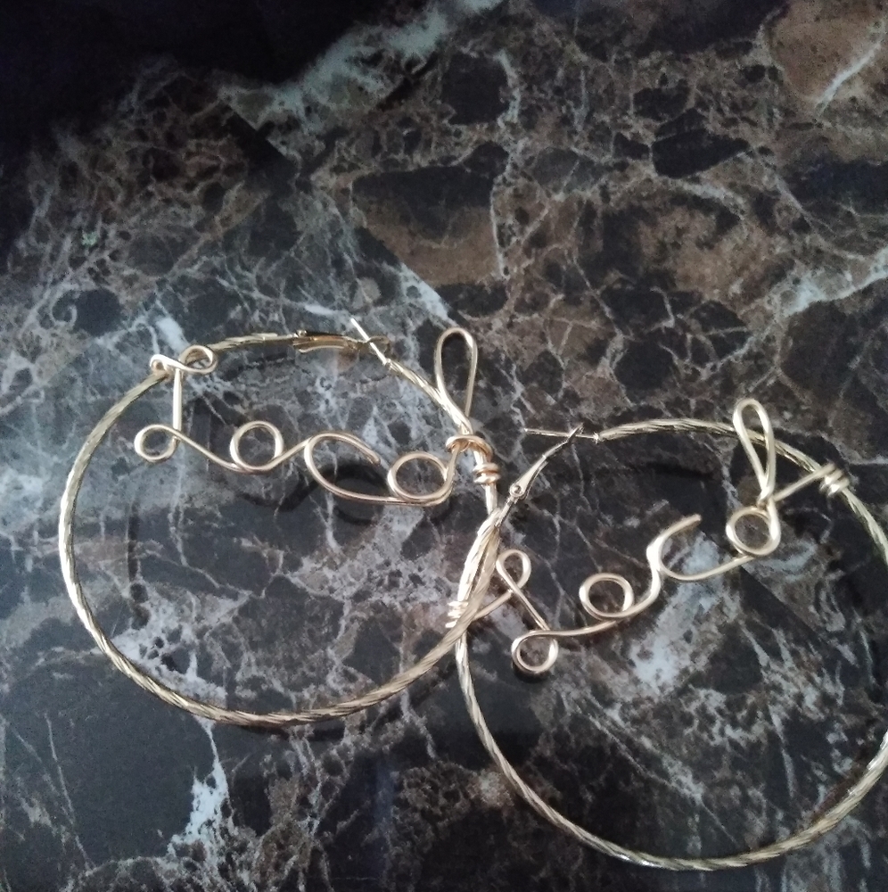 Gold Wire script "locd" earrings